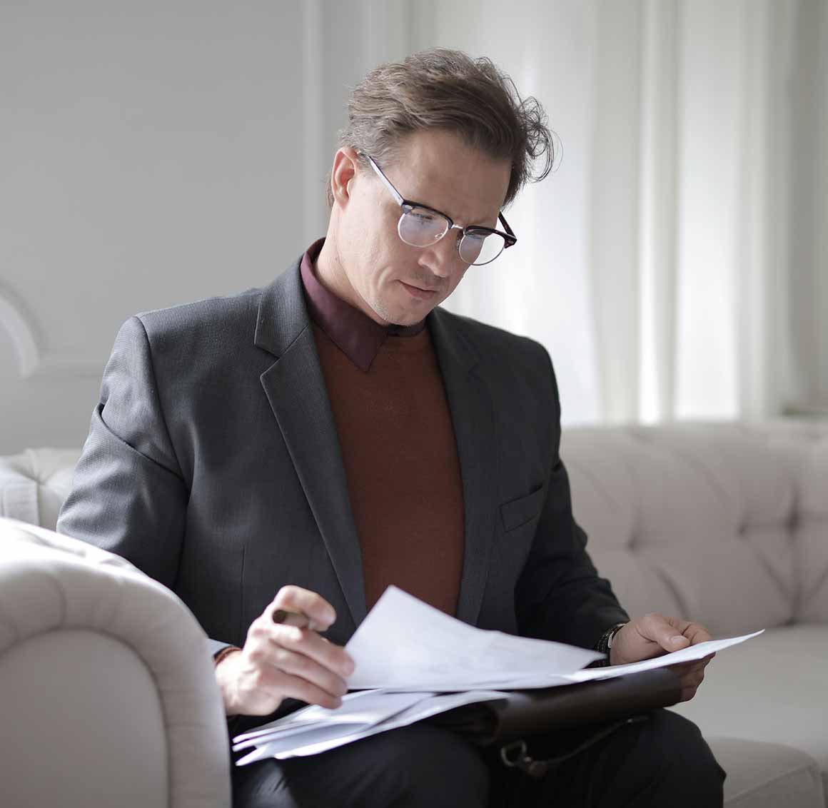 Man Going through Papers Man Going through Papers